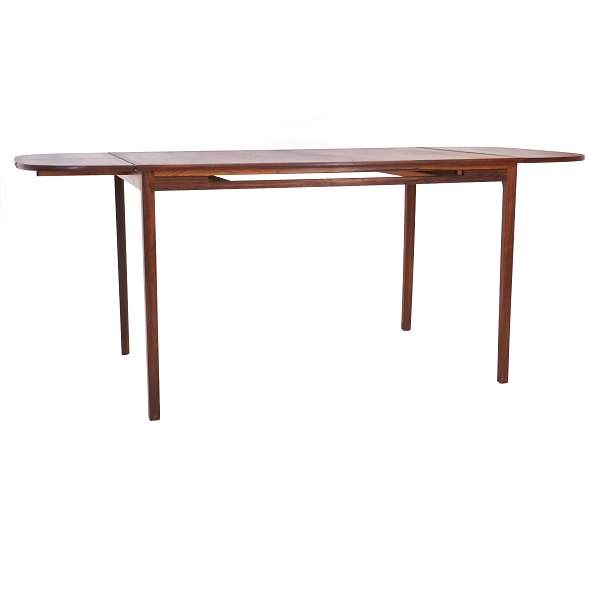 Ole Wanscher skrivebord med to tillægsplader i mahogni og palisander udført af A. J. Iversen. Udstillet på Københavns Snedkerlaugs Møbeludstilling 1965. H: 74cm. B: 79cm. L: 120 / 151,5 / 183cm